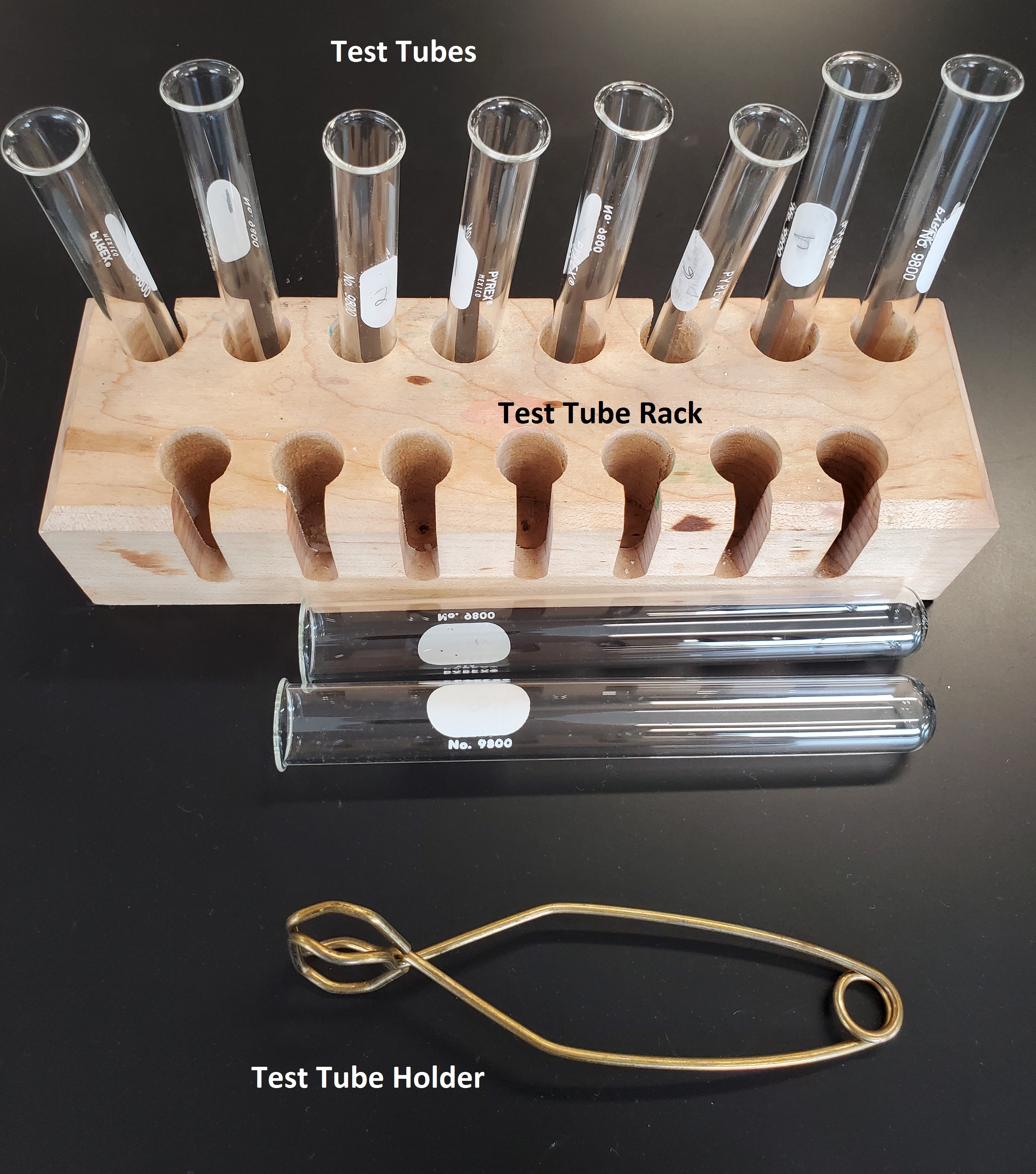 Picture of test tubes, test tube holder, and rack