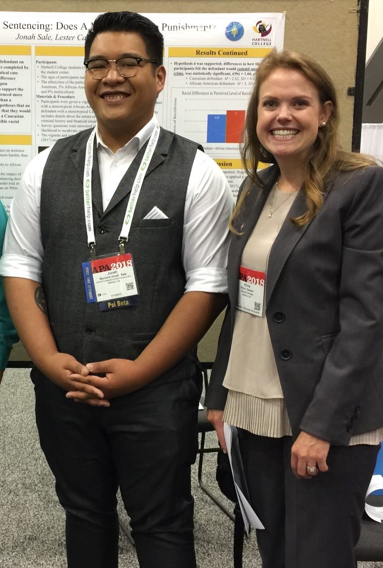 Psychology students present their research at a conference