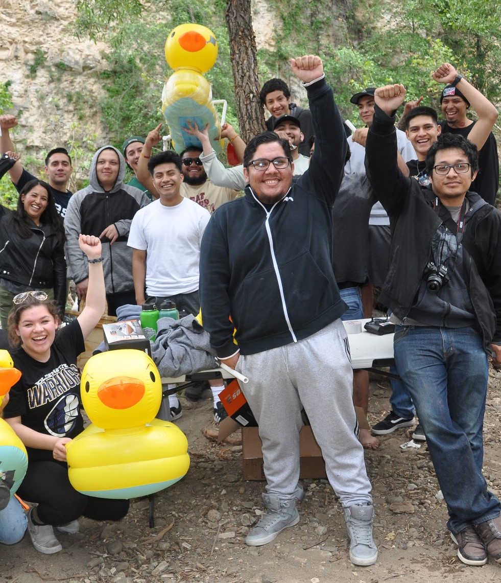 STEM Club members celebrate after duck race