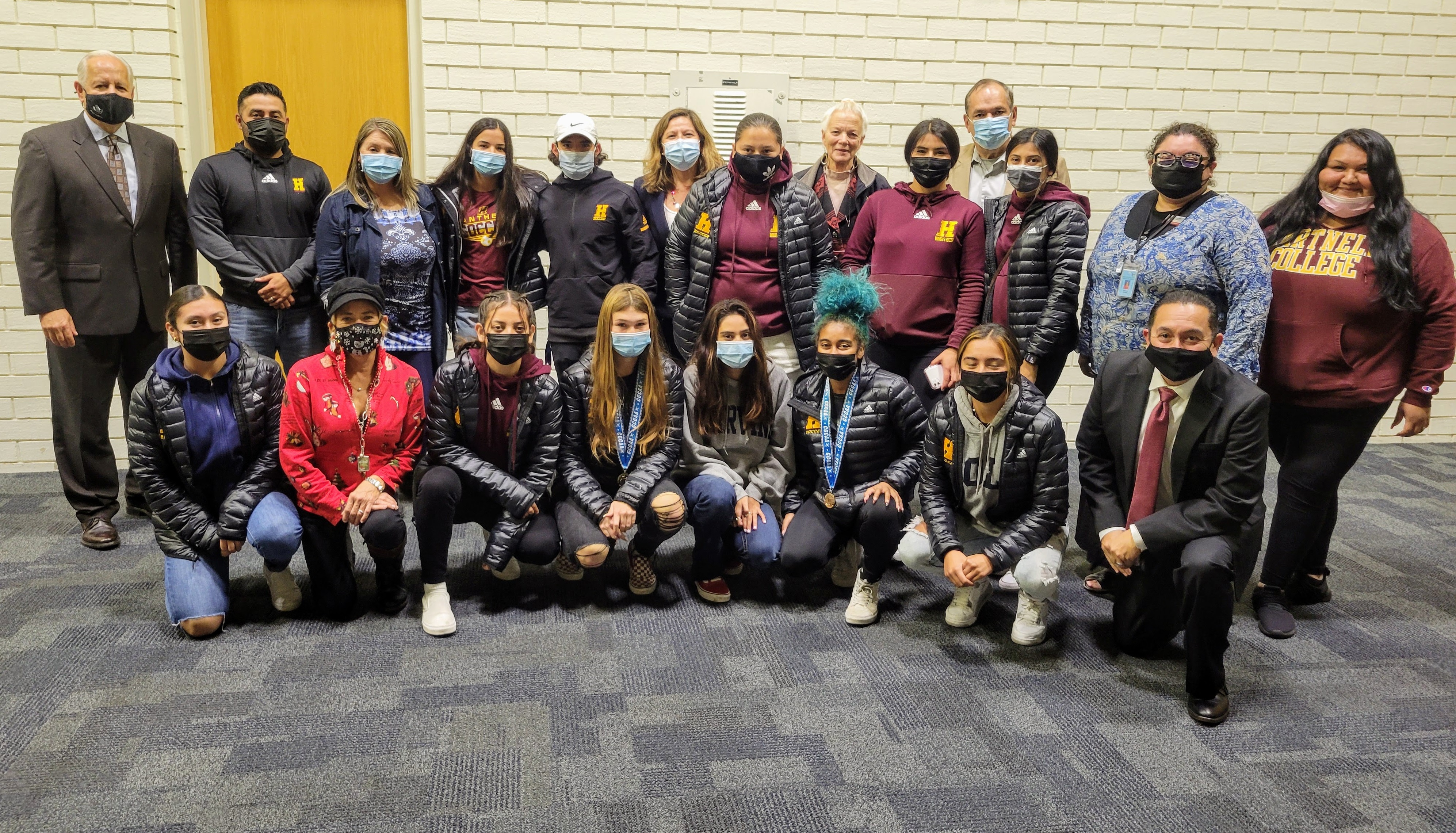 Picture of Dr. Rodriguez and sports teams being honored Picture of Dr. Rodriguez and sports teams being honored