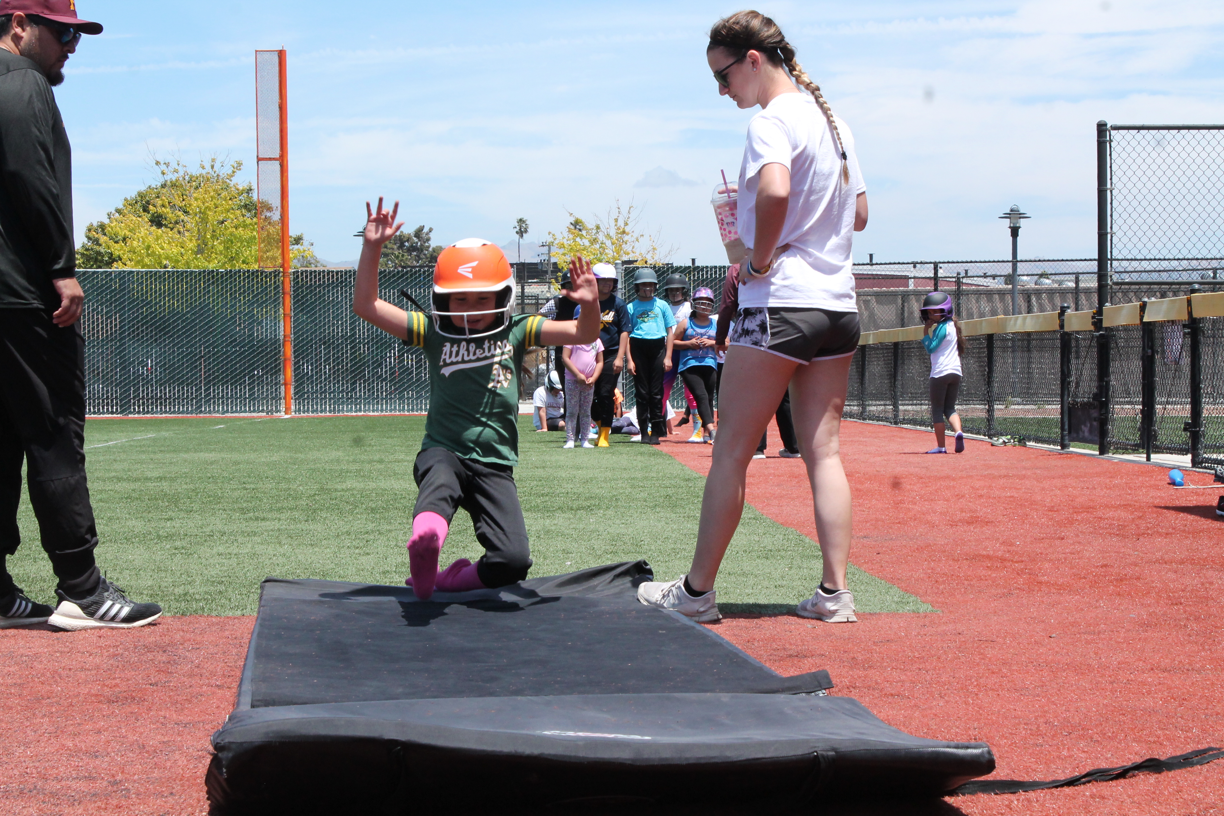 photo of girl sliding for softball camp Photo of girl sliding for softball camp