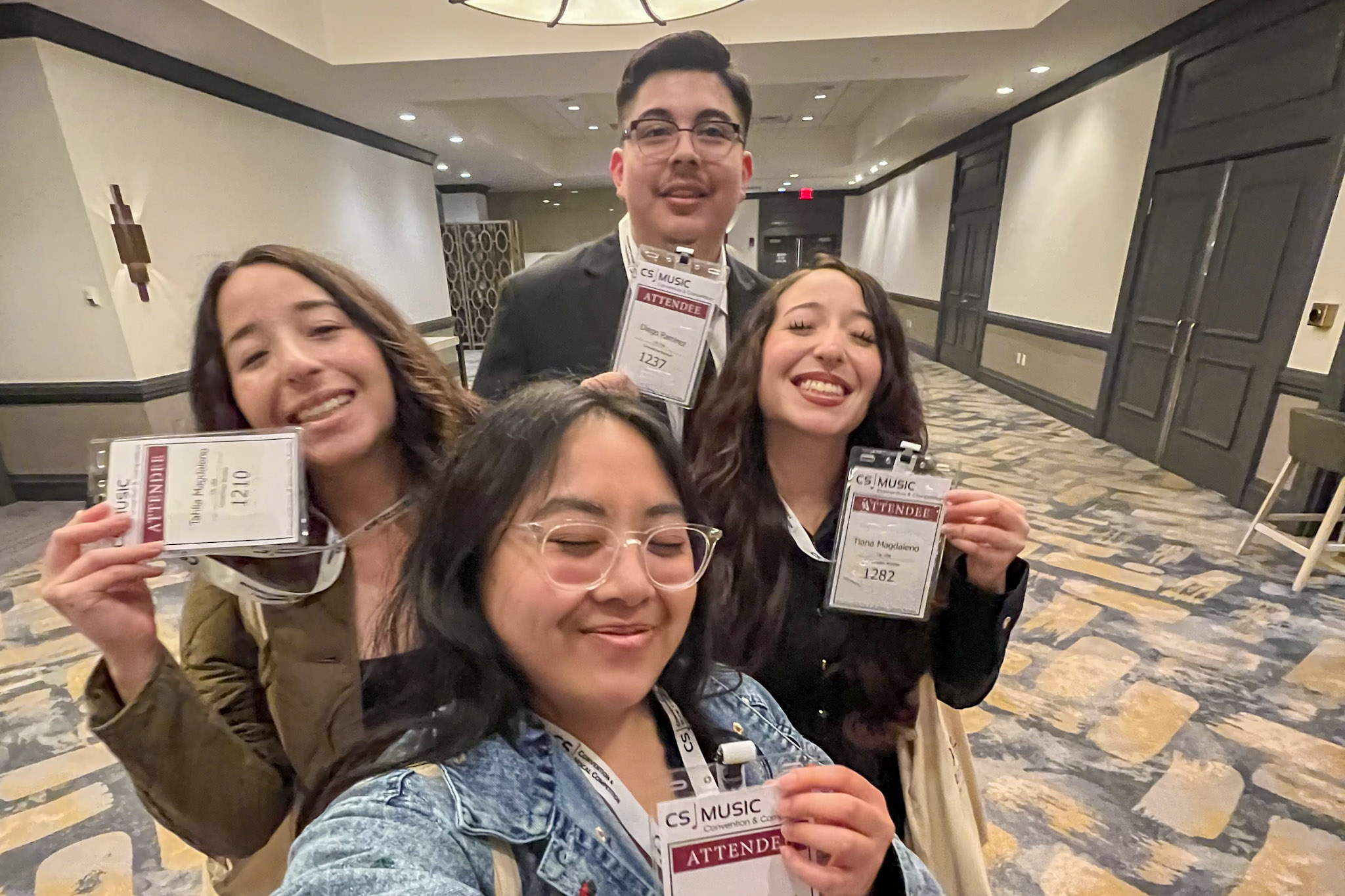 Four Hartnell College music students and Killian Music Scholarship recipients smile for a selfie while attending the 2026 Classical Singer Convention and Competition in Boston, where they competed in the collegiate vocal divisions.